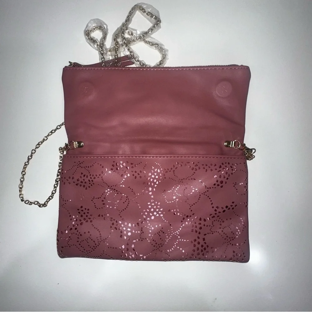 Urban Expressions Pink Laser Cut “Locket” Clutch. New without tags
